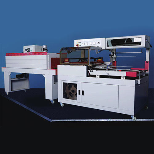 AUTOMATIC HEAT SHRINKABLE SEALING AND CUTTING MACHINE